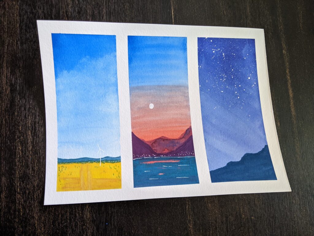 Watercolor painting in three panels of a field, a sunset lake, and midnight mountains.